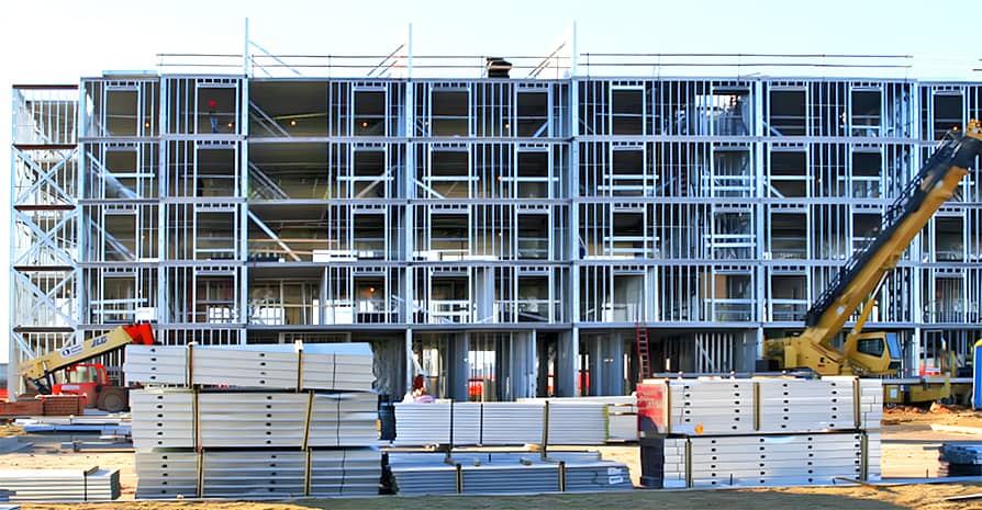 Cold formed steel buildings constructed with a light gauge steel frame and operated using a cold formed steel machine and advanced framing machine in an LGSF construction project.