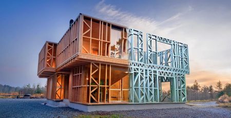 Timber wood versus light gauge steel: comparing old and modern building methods, highlighting steel frame construction with cold-formed steel framing from a steel framing machine.