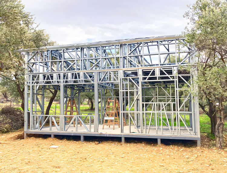 Cold formed steel buildings constructed with a light gauge steel frame and operated using a cold formed steel machine and advanced framing machine in an LGSF construction project.