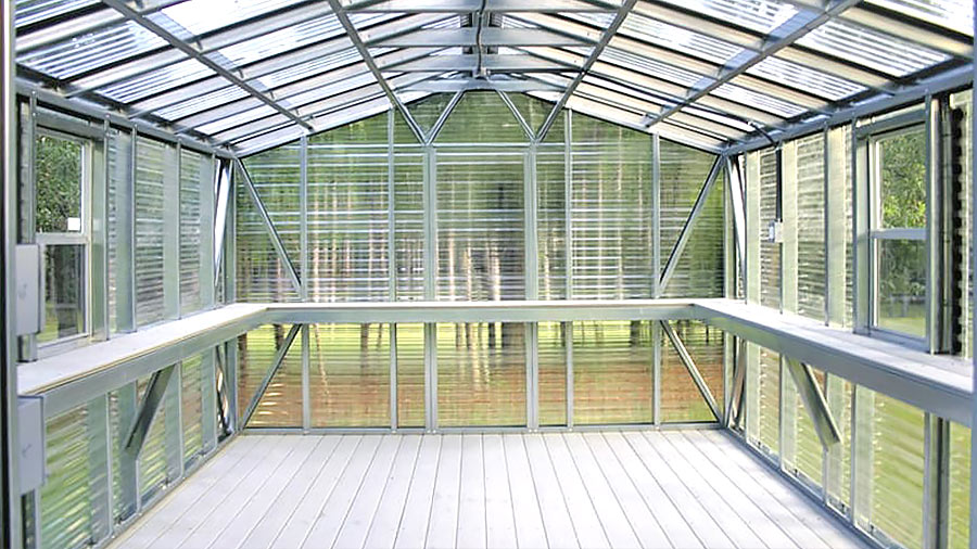 Modern greenhouse construction with light gauge steel framing machines. Sustainable cold formed steel structures designed for efficient steel framing in agriculture.