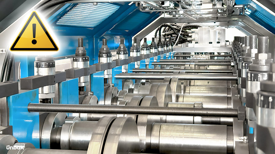 Warning indicator inside a light steel framing machine highlighting the importance of proper maintenance and safe operation.”